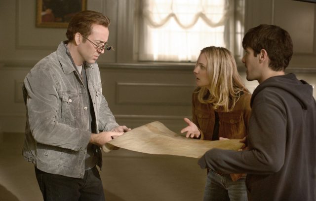 Nic Cage holds the Declaration of Independence in the film National Treasure.