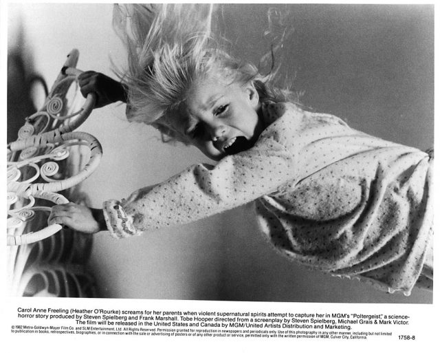 Heather O'Rourke as Carol Anne in 1982's Poltergeist