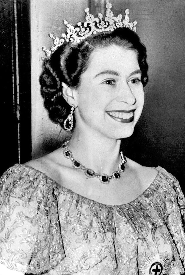 Queen Elizabeth in 1953, smiling for the camera