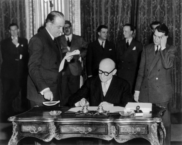 Schuman signing the European Coal and Steel Community treaty 