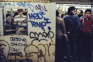 People standing in a New York City subway train