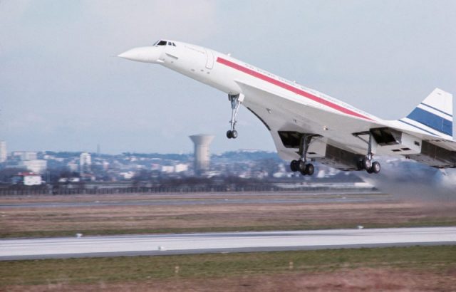 The Concorde takes off from a runway for its first flight.