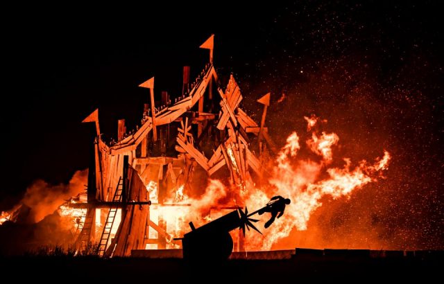 A "greatest showman" themed bonfire burns in skinningrove, north yorkshire as part of an annual themed bonfire reflecting the area's history.