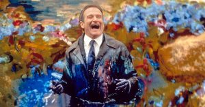 Robin Williams is covered in paint in a scene from the film 'What Dreams May Come', 1998.