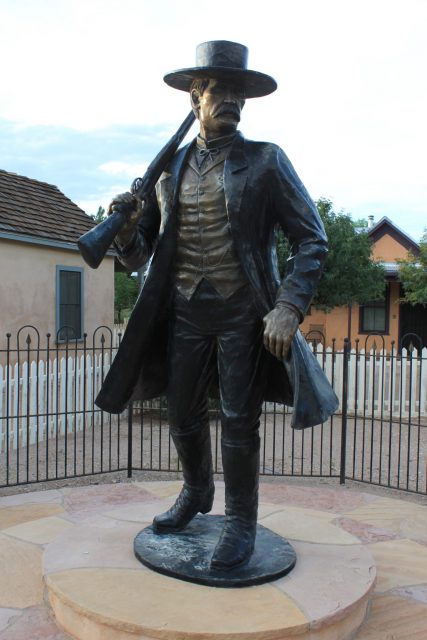This statue is a depiction of the famous lawman Wyatt Earp situated beside the Earp House in Tombstone, AZ.