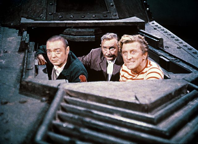 Peter Lorre, Paul Lukas and Kirk Douglas sticking their heads out of the Nautilus
