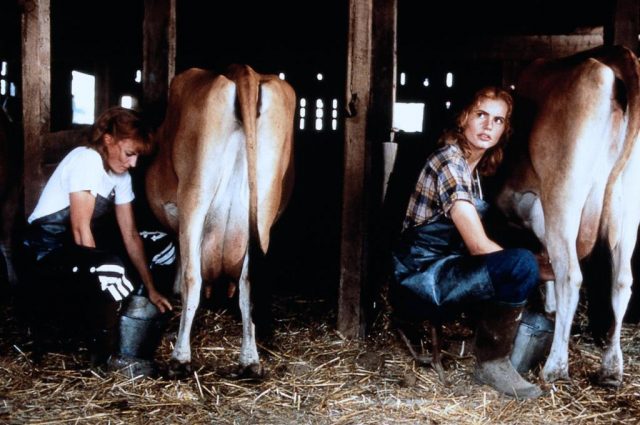 Lori Petty and Geena Davis milking cows