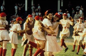 Members of the Rockford Peaches celebrating on the pitch