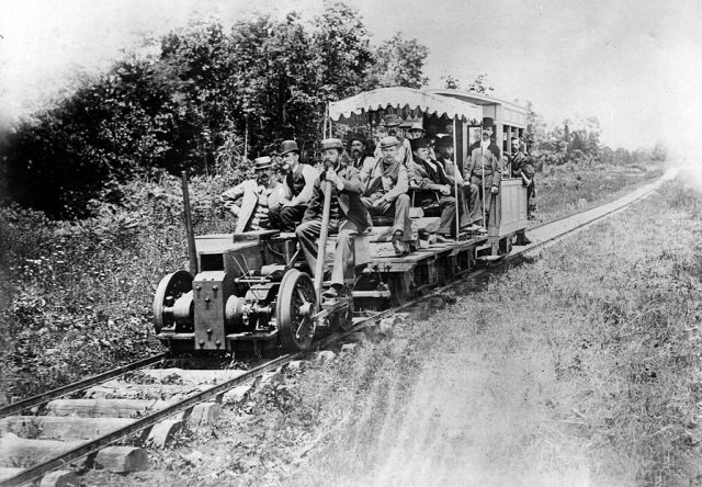 Men riding on a train