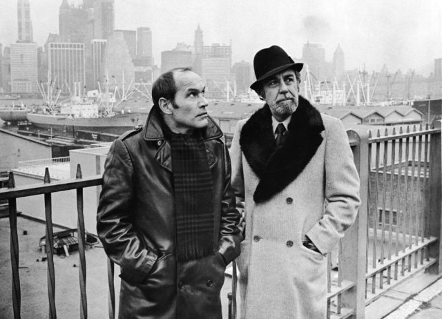 French actor Marcel Bozzuffi and Spanish actor Fernando Rey wait for an accomplice by a pier in Brooklyn in a still from the film ‘The French Connection’ (Photo Credit: 20th Century Fox/Courtesy of Getty Images)