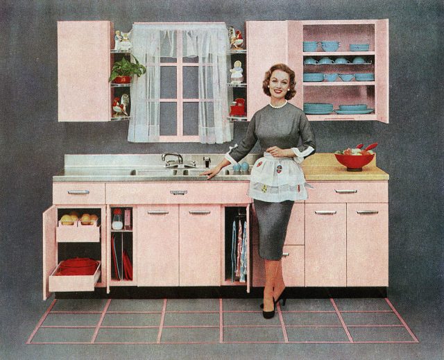 Woman standing in front of a kitchen counter