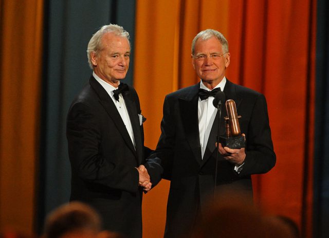 Bill murray and david letterman speak onstage at the first annual comedy award. (photo credit: jeff kravitz/filmmagic)