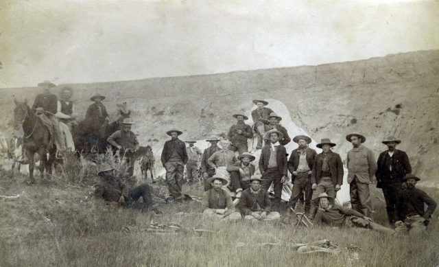Cowboys Wearing Great Cowboy Hats. A Few Cowboys Are On Horses. They Are Probably Cattle Men On The Range. (Photo Credit: Buyenlarge/Getty Images)