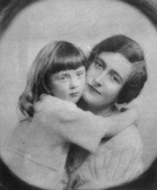 Rosalind holding onto Agatha Christie's neck
