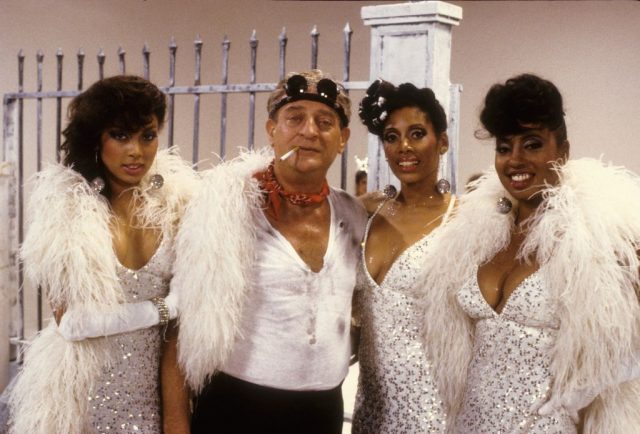Comedian rodney dangerfield and his back-up singers pose for a photo on the set of the music video for “rappin’ rodney” in 1983 in los angeles, california. (photo credit: michael ochs archive/getty images)