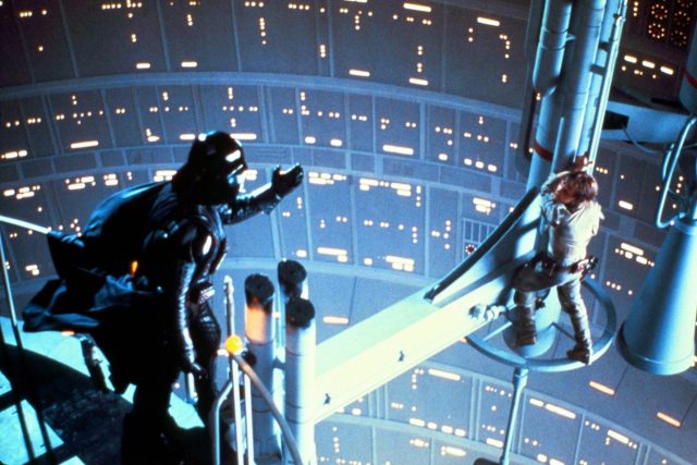 Darth Vader reaching out to Luke Skywalker