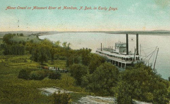 Postcard of the abner o'neal docked beside land