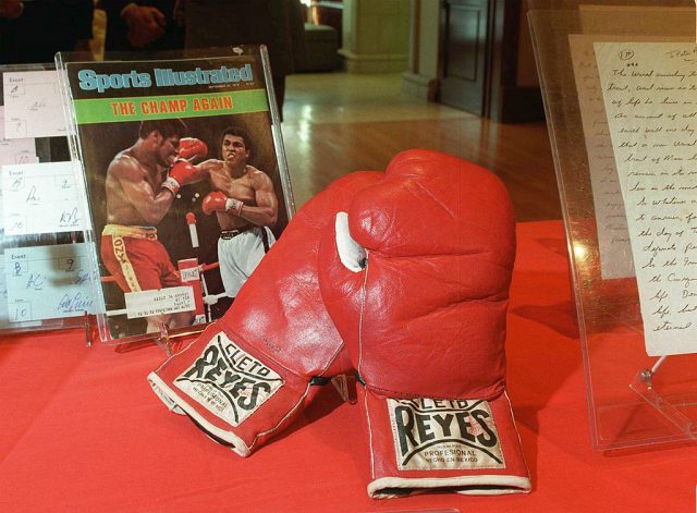 Muhammad Ali’s boxing gloves which he used in the 2nd fight with Leon Spinks is auctioned from the Ronnie Paloger collection at Christie’s Auction House October 9, 1997 in Beverly Hills, CA. The gloves are expected to fetch $40,000. (Photo Credit: Paul Harris/Online USA)