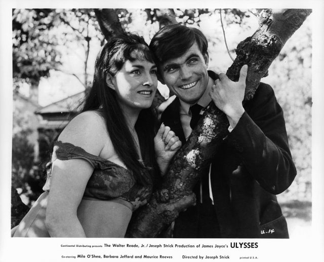 Barbara Jefford and Maurice Roeves smiling near tree branch in a scene from the film ‘Ulysses’, 1967. (Photo Credit: Continental Distributing/Getty Images)