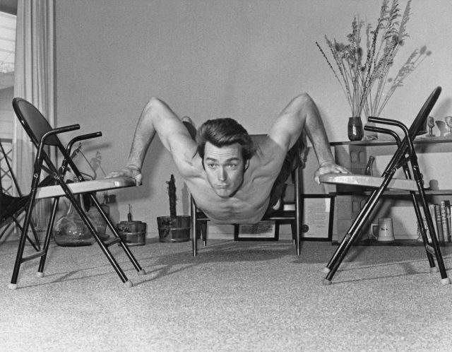 American actor Clint Eastwood exercising, circa 1960. (Photo Credit: FPG/Archive Photos/Getty Images)