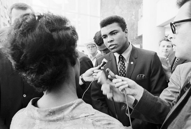 Boxer Muhammad Ali talking with the press after being indicted by a Federal Grand Jury for his refusal to be inducted into the armed forces. Ali contended that he was a Nation of Islam minister and not subject to the draft. (Photo Credit: Bettmann / Contributor)
