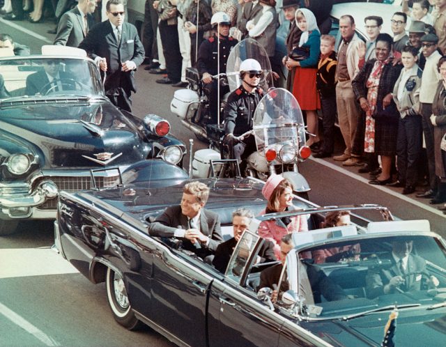 John F. Kennedy riding in the Dallas motorcade
