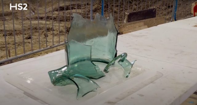 Broken glass jug on a table