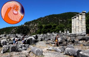 Woman walking through the remnants of an ancient Greek city + Zeus smiling