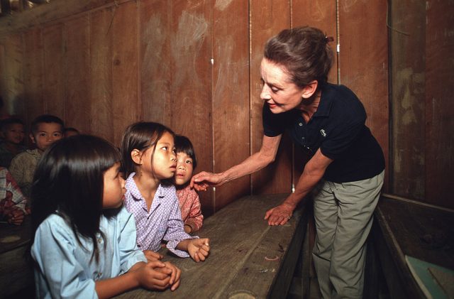 Audrey Hepburn speaking with children in Vietnam