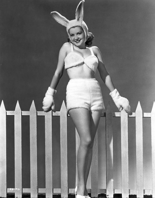 Barbara Bates dressed in a white bunny costume
