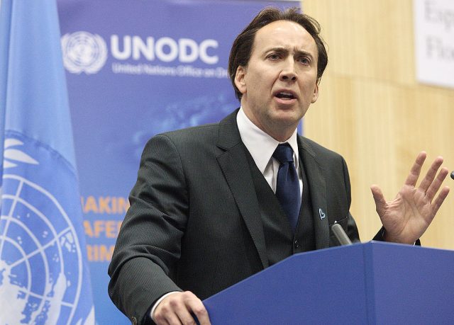 US actor and Goodwill Ambassador for Global Justice Nicolas Cage gestures as he speaks at the fifth session of Parties to the United Nations Convention against Transnational Organized Crime. AFP PHOTO/DIETER NAGL (Photo Credit: DIETER NAGL/AFP via Getty Images)