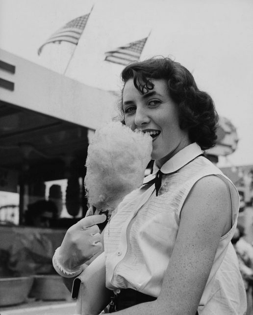 Miss June Berryman Eating A Cotton Candy, At Coney Island In Usa-Western World-North America (Photo Credit: Keystone-France/Gamma-Keystone via Getty Images)