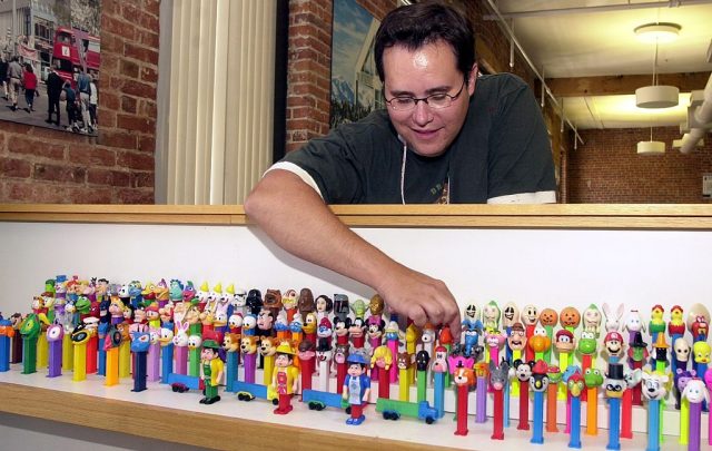 Tracy Weil and some of his Pez dispenser collection at his LoDo office. (Photo Credit: John Epperson/The Denver Post via Getty Images)
