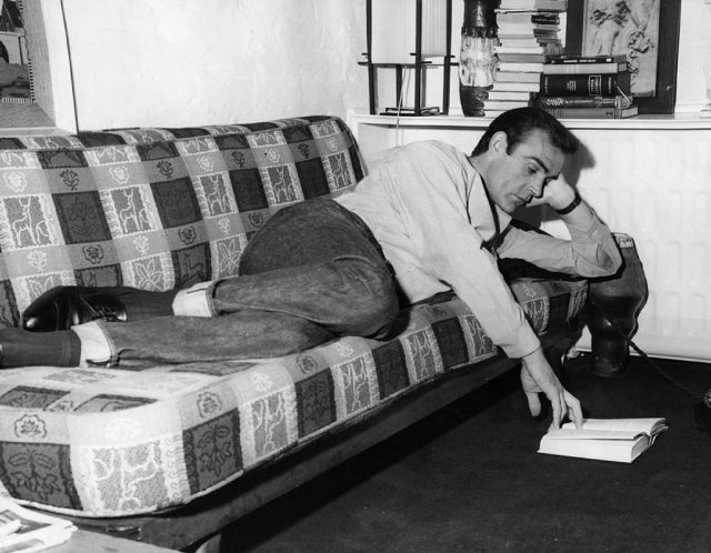 Scottish actor Sean Connery relaxing in his ground floor basement flat in NW5. (Photo Credit: Keystone Features/Getty Images)