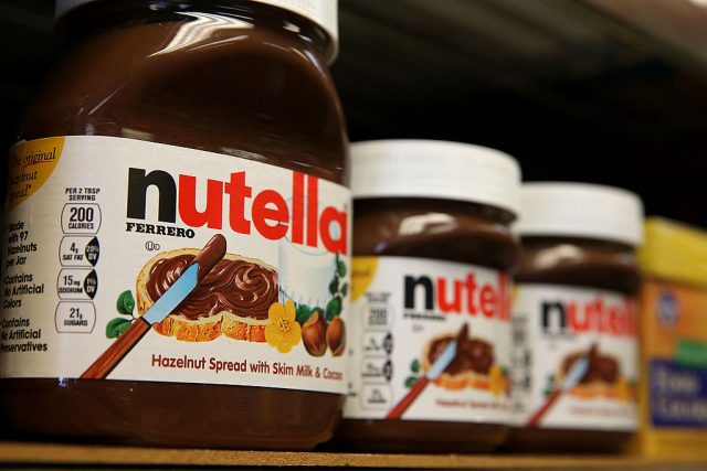 Jars of Nutella are displayed on a shelf at a market (Photo Credit: Justin Sullivan/Getty Images)