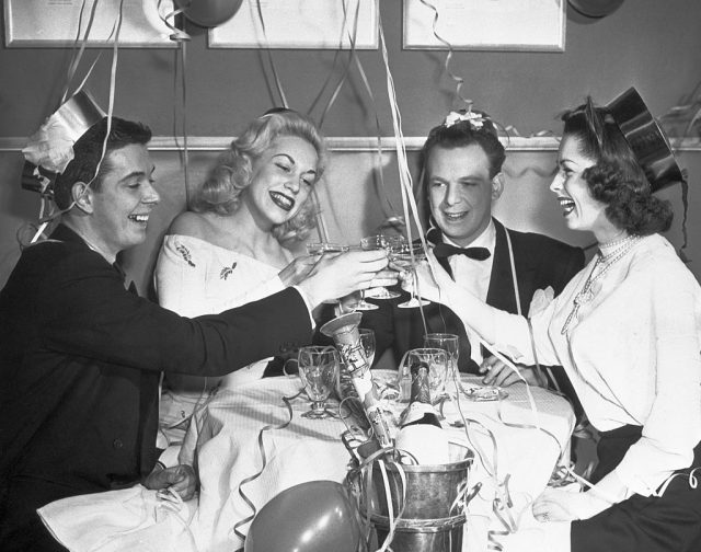 Toasting in the New Year. (Photo Credit: Bettmann / Contributor)