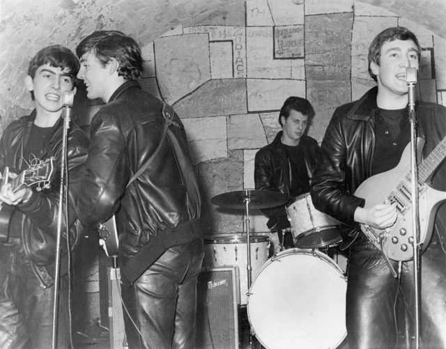 The Beatles performing on stage at The Cavern Club
