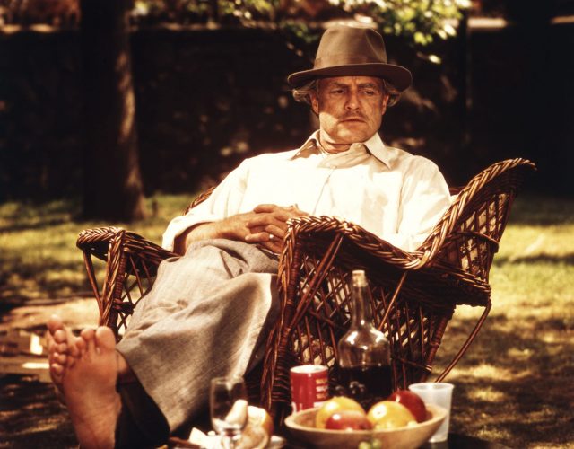 Marlon Brando and a bowl of fruit in The Godfather (Photo Credit: Paramount Pictures & MovieStillsDB)