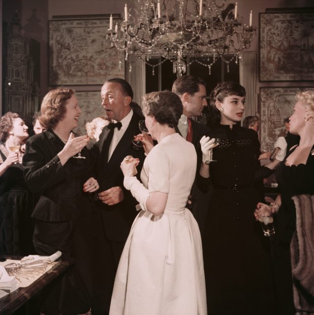Audrey Hepburn socializing at a party