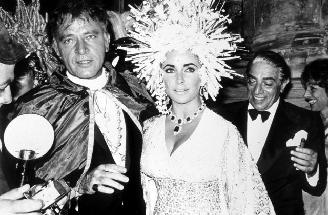 Elizabeth Taylor and Richard Burton at a masquerade party