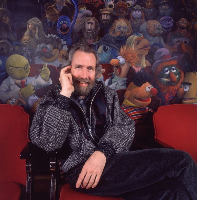 Jim Henson sitting in a theater chair