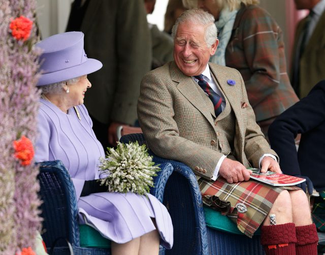 Queen Elizabeth II and Prince Charles, Prince of Wales attend the 2016 Braemar Highland Gathering
