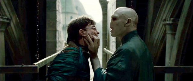 Voldemort grabbing Harry Potter's face