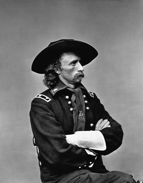 A seated right-profile of George Armstrong Custer 