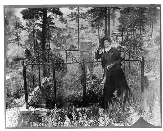 Calamity Jane at Wild Bill Hickock's grave