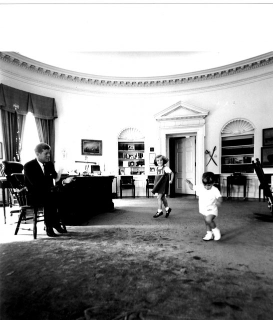 JFK in Oval Office with Caroline and JFK Jr. 