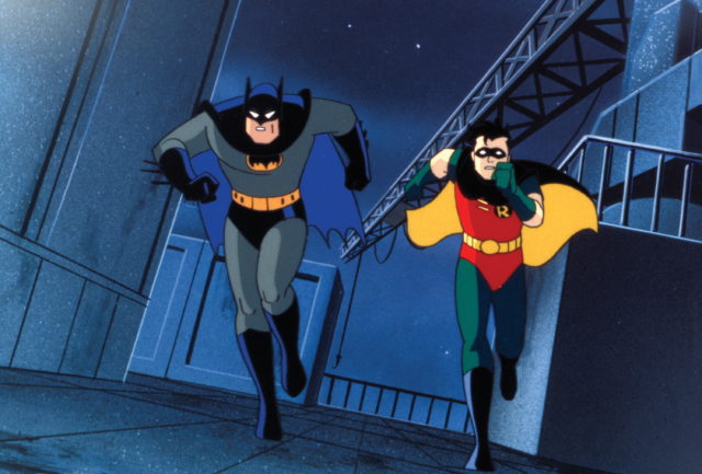 Batman and Robin running at night