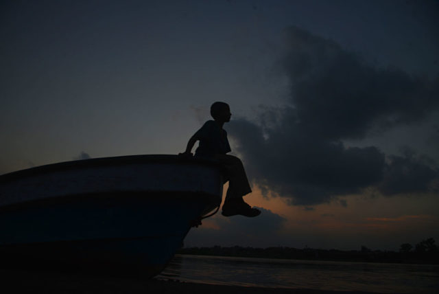 a boy on a boat