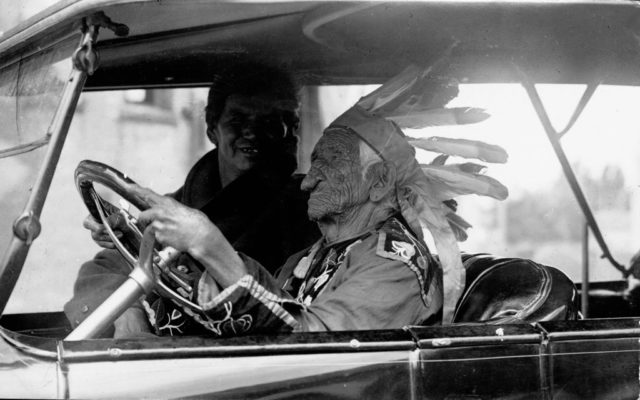 Chippewa chief Chief Kah-Be-Nah-Gwey-Wence driving