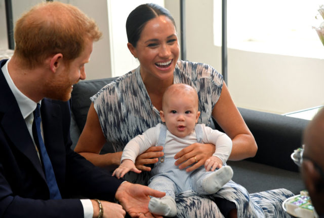 Meghan Markle laughs as she holds Baby Archie